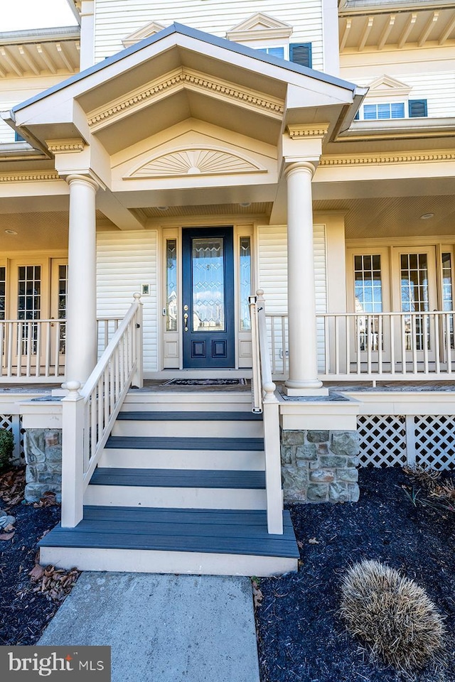 entrance to property with a porch