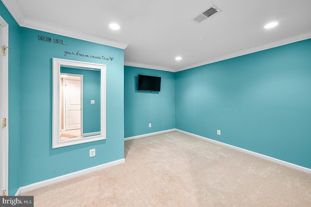 empty room with visible vents, baseboards, ornamental molding, carpet floors, and recessed lighting