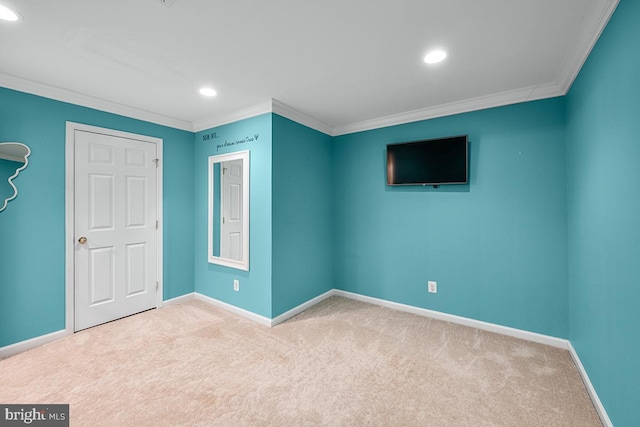 unfurnished bedroom with recessed lighting, baseboards, carpet floors, and ornamental molding