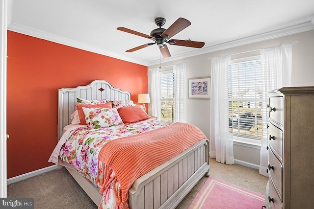 bedroom featuring ceiling fan, baseboards, light carpet, and ornamental molding