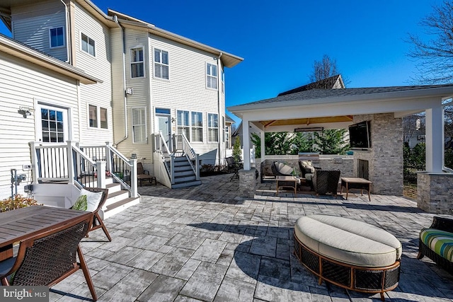 view of patio with outdoor dry bar and an outdoor hangout area