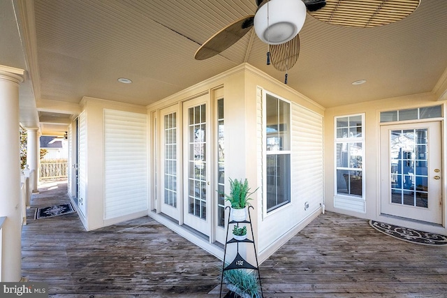 wooden deck with ceiling fan