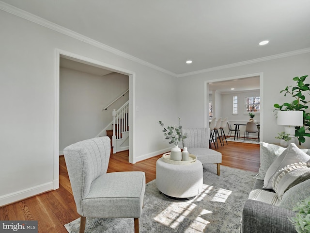 living room featuring ornamental molding, wood finished floors, recessed lighting, stairway, and baseboards