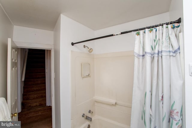 full bathroom featuring shower / tub combo with curtain