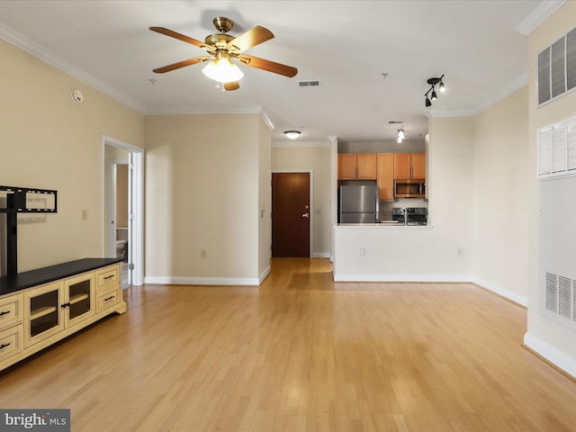 unfurnished living room with light wood finished floors, visible vents, ceiling fan, and ornamental molding