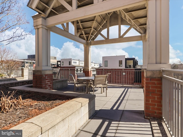 view of patio / terrace featuring outdoor dining space and a gazebo