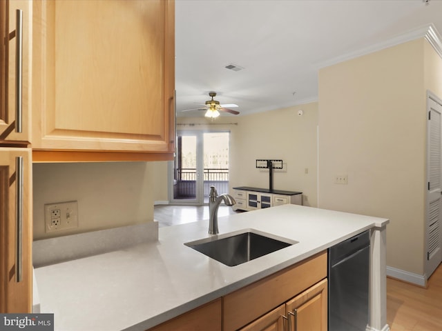 kitchen featuring visible vents, a ceiling fan, a sink, stainless steel dishwasher, and crown molding