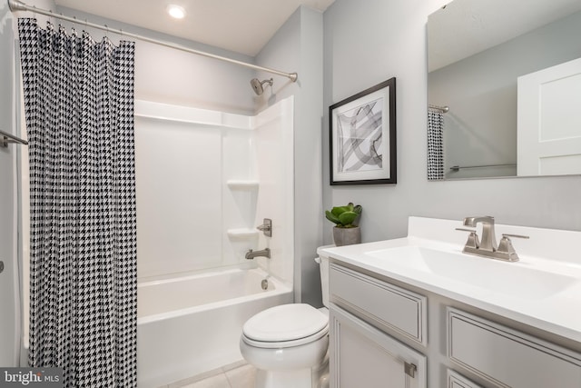 full bathroom featuring tile patterned flooring, toilet, vanity, and shower / bathtub combination with curtain