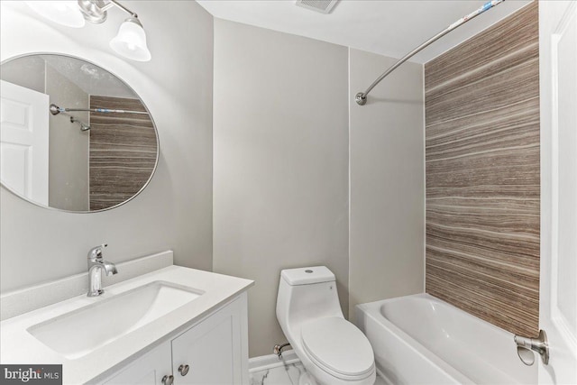 bathroom with vanity, toilet, marble finish floor, and shower / bath combination