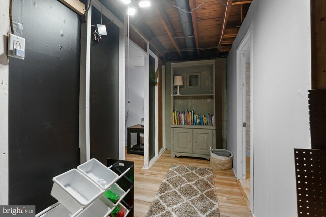 hallway featuring light wood-style flooring