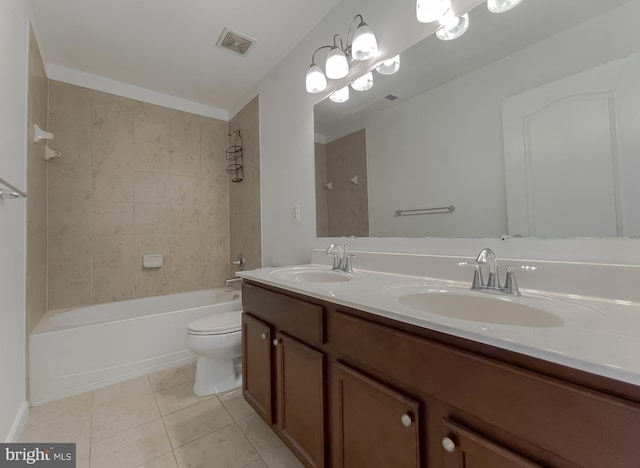 bathroom featuring a sink, visible vents, toilet, and tile patterned flooring