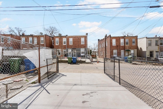 exterior space featuring a gate and fence
