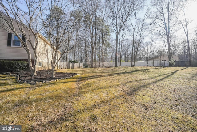 view of yard featuring fence