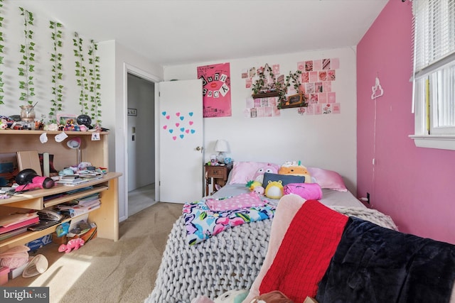 bedroom featuring carpet