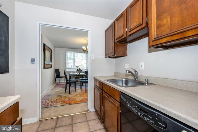1900 Lyttonsville Rd Unit 418, Silver Spring, MD 20910 - kitchen featuring baseboards, light colored carpet, light countertops, a sink, and dishwasher
