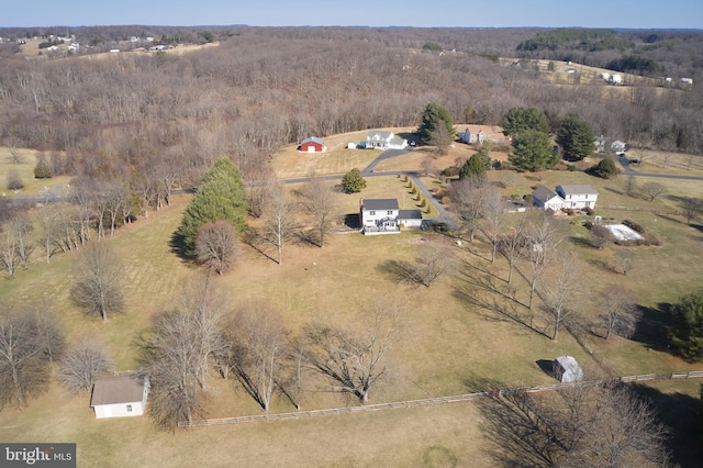 birds eye view of property featuring a rural view