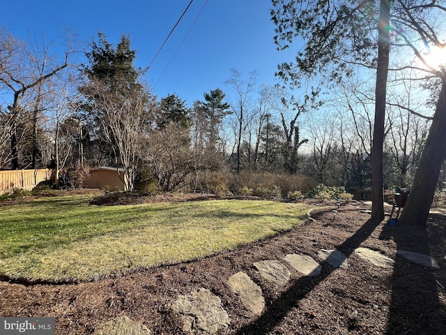 view of yard with fence