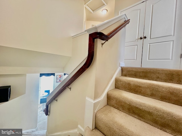 staircase with baseboards