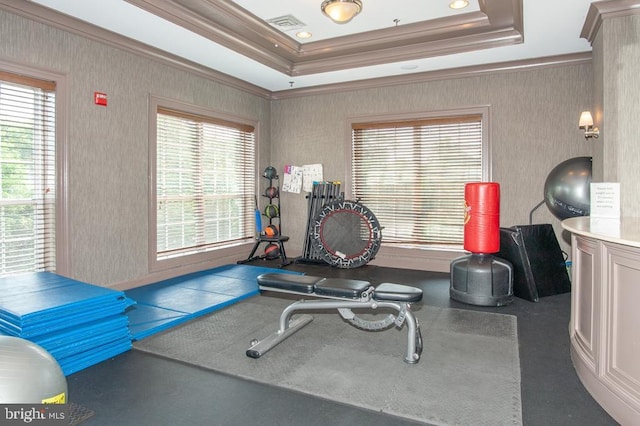 exercise area with wallpapered walls, a tray ceiling, recessed lighting, and ornamental molding