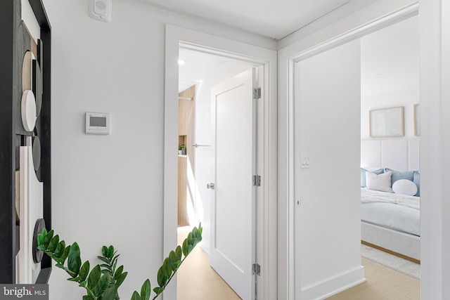 hallway featuring light wood finished floors