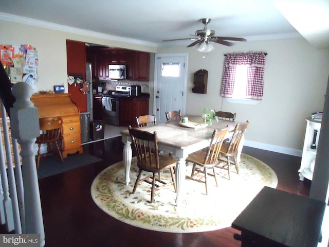 dining area featuring baseboards, ceiling fan, and ornamental molding