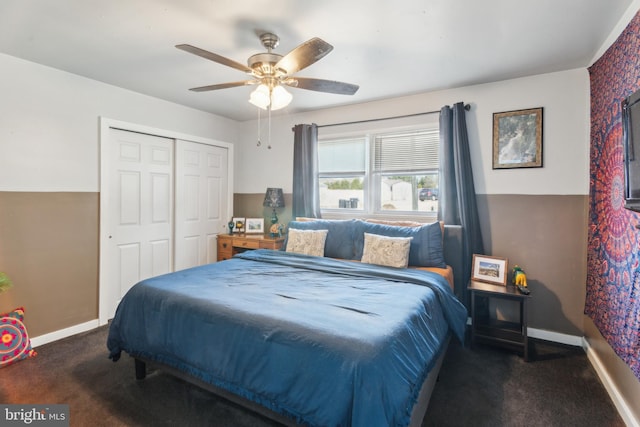 bedroom featuring a closet, a ceiling fan, baseboards, and carpet floors