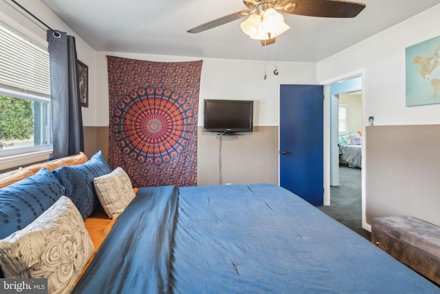 bedroom with carpet flooring and a ceiling fan