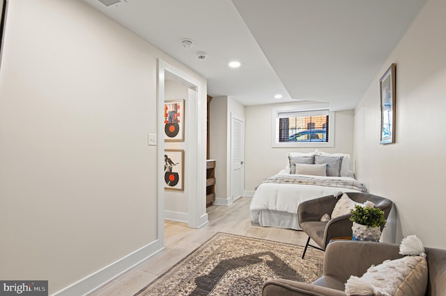 bedroom featuring recessed lighting and baseboards