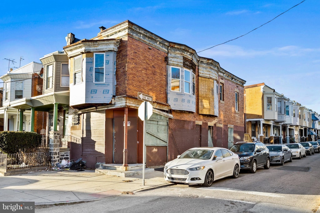 view of building exterior with a residential view