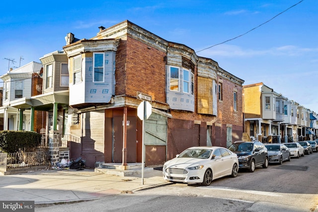 view of building exterior with a residential view