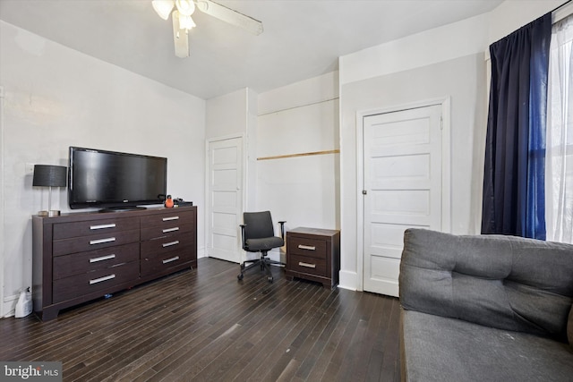 office space with dark wood-style floors and a ceiling fan