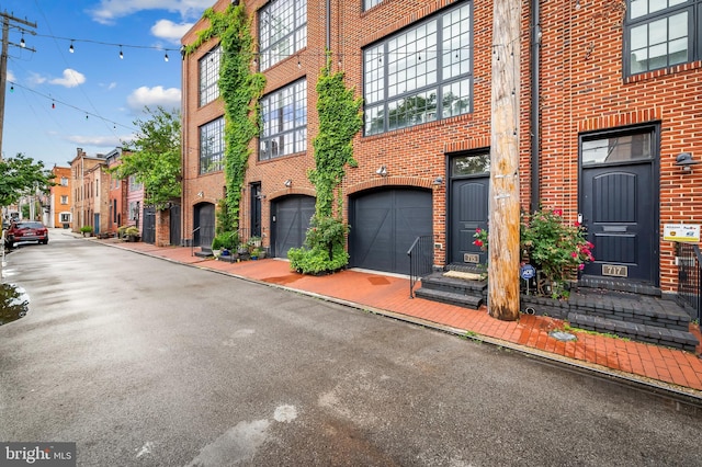 view of building exterior featuring a garage