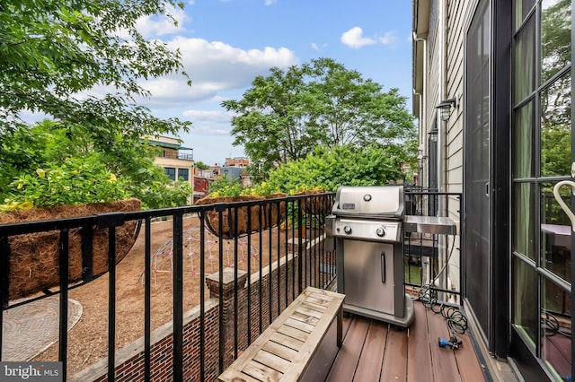 balcony featuring a grill