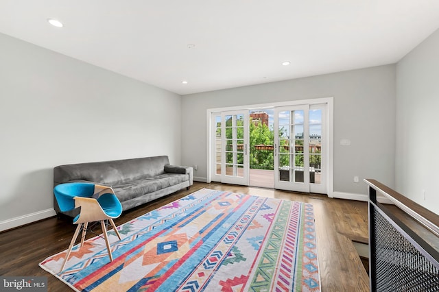 interior space with recessed lighting, baseboards, and wood finished floors