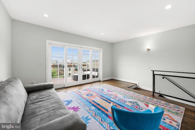 living area featuring recessed lighting, french doors, and wood finished floors