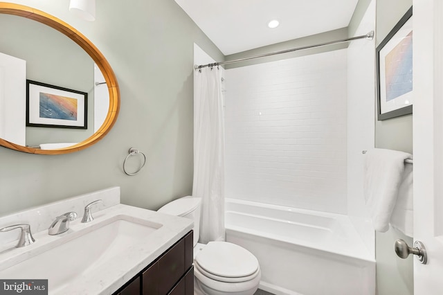 full bathroom featuring vanity, toilet, and shower / tub combo with curtain