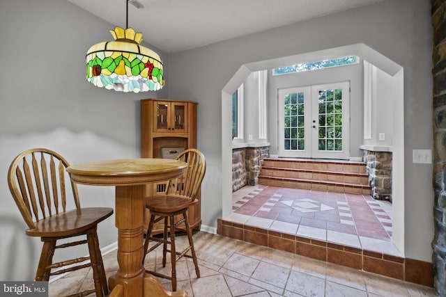8359 Elm Rd, Millersville, MD 21108 - dining area with french doors and tile patterned floors