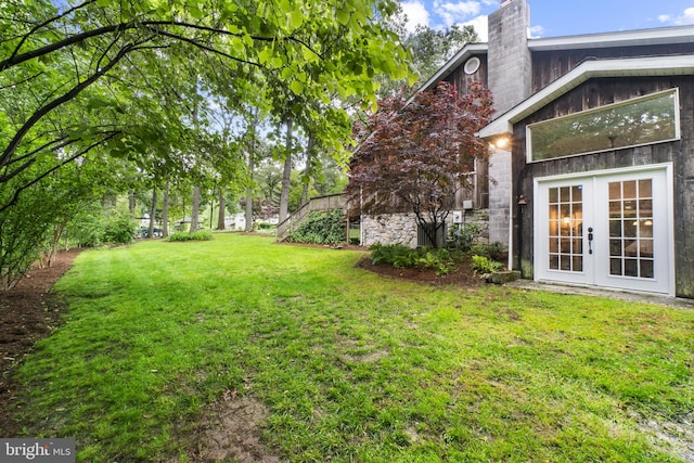 8359 Elm Rd, Millersville, MD 21108 - view of green lawn featuring french doors