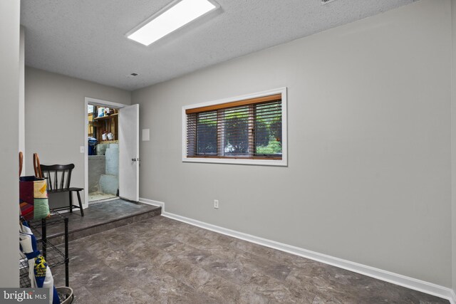 8359 Elm Rd, Millersville, MD 21108 - unfurnished office with a textured ceiling and baseboards