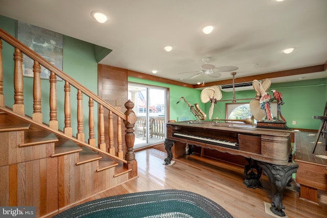 living area featuring stairs, recessed lighting, wood finished floors, and ceiling fan