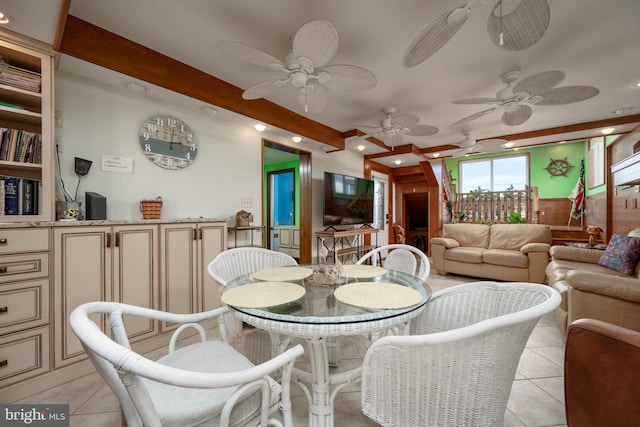 dining area with beam ceiling, light tile patterned floors, and recessed lighting