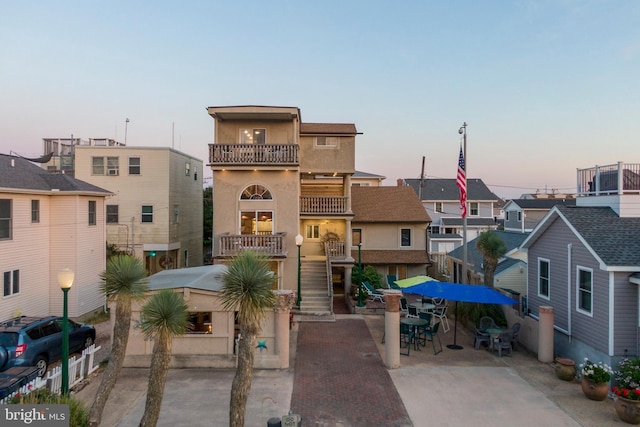 view of property at dusk