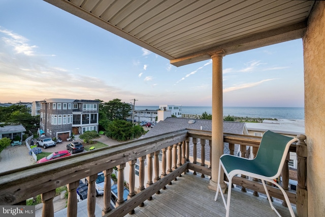 balcony at dusk with a water view