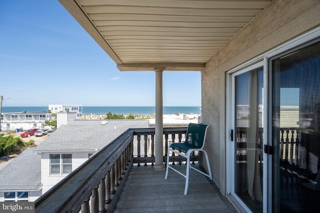 balcony featuring a water view