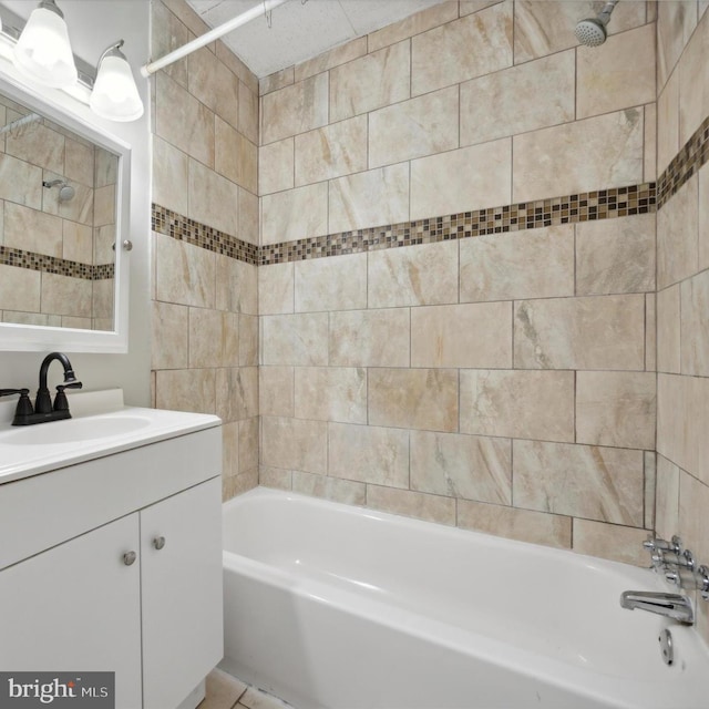 bathroom featuring vanity and shower / bath combination