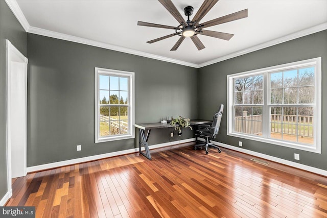 office with a ceiling fan, crown molding, baseboards, and wood-type flooring