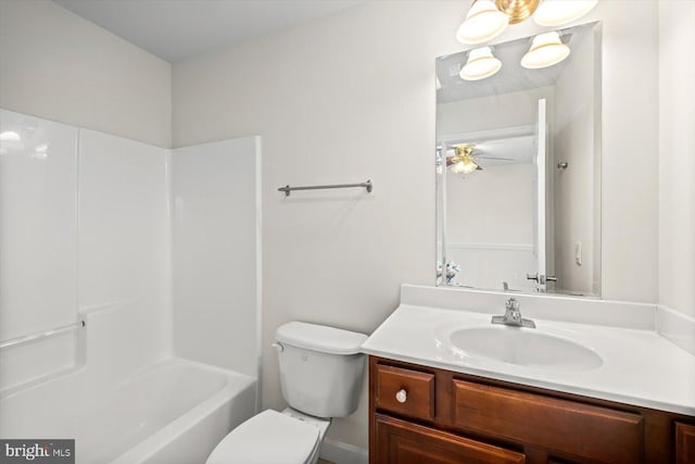 bathroom featuring toilet and vanity