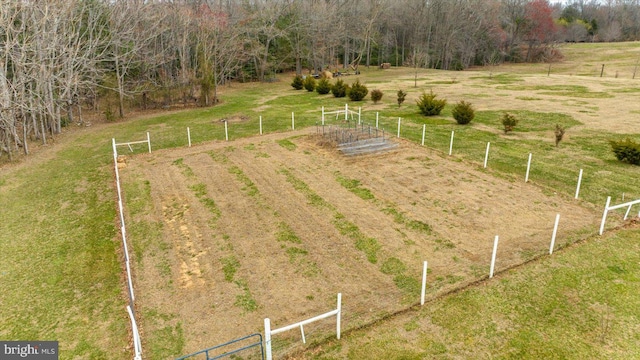 exterior space featuring a rural view and fence