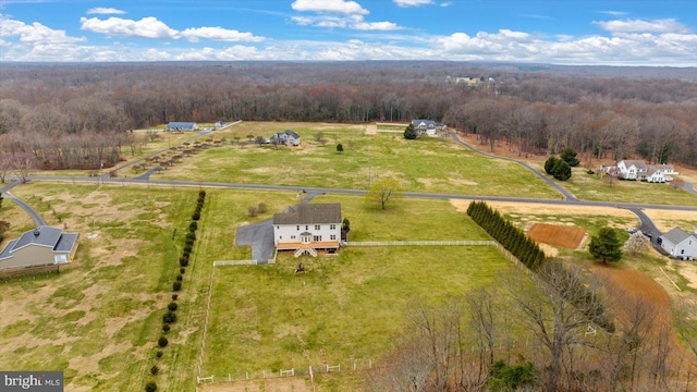 bird's eye view with a rural view and a forest view