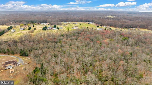 drone / aerial view with a forest view